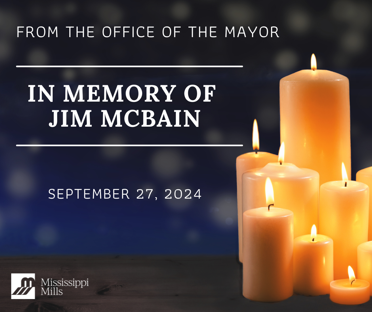 Photo of lit candles of various sizes with the text 'From the Office of the Mayor - In Memory of Jim McBain'