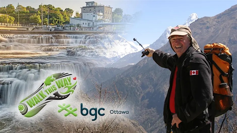 Photo of man pointing at mountain with waterfalls in the background