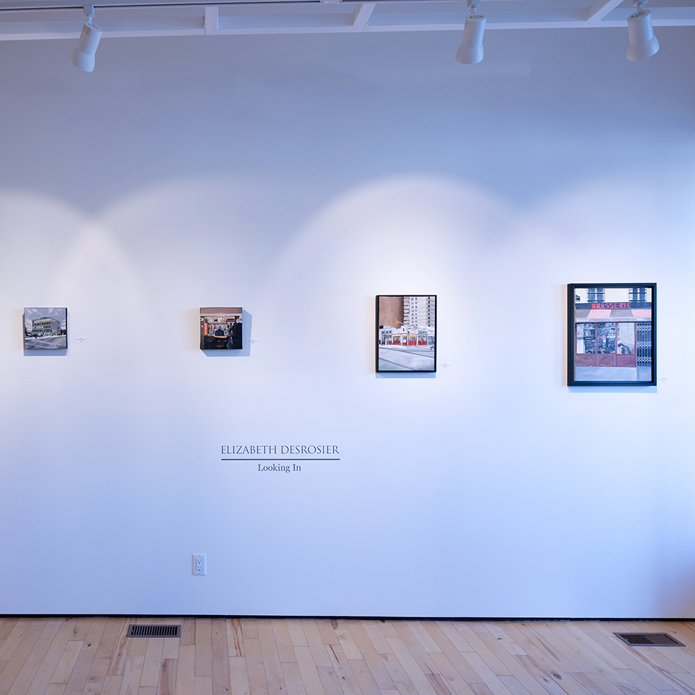 Photo of gallery wall with artwork displayed